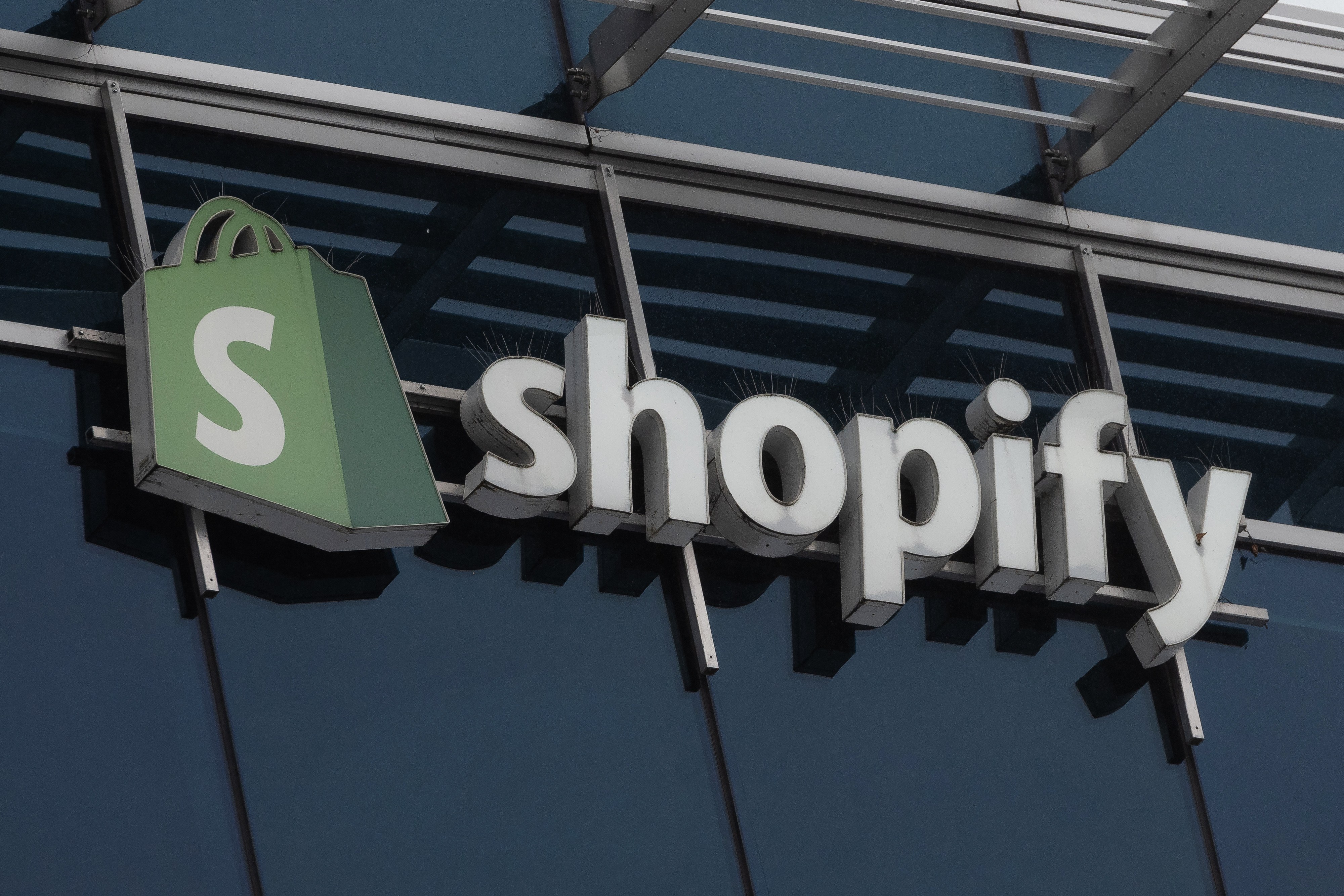 Shopify opens checkout to autonomous buyers while Amazon locks the door